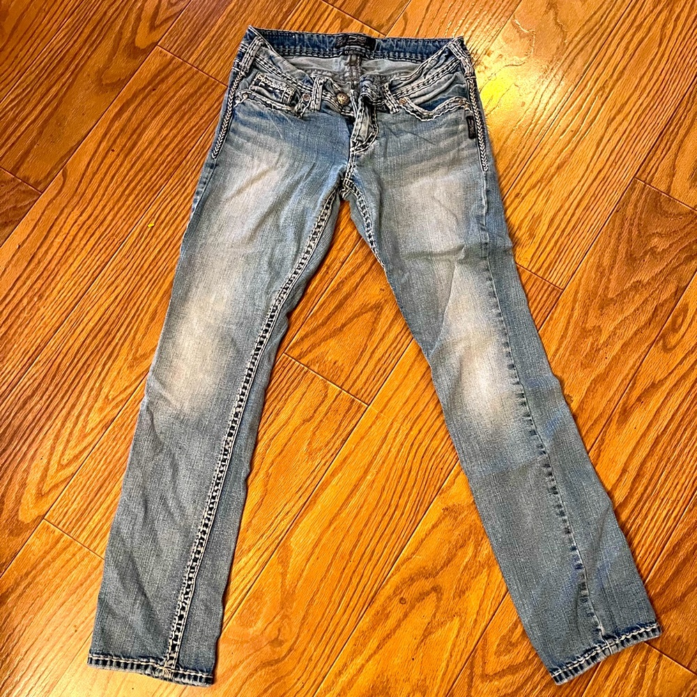 Woman’s silver jeans. 28/33